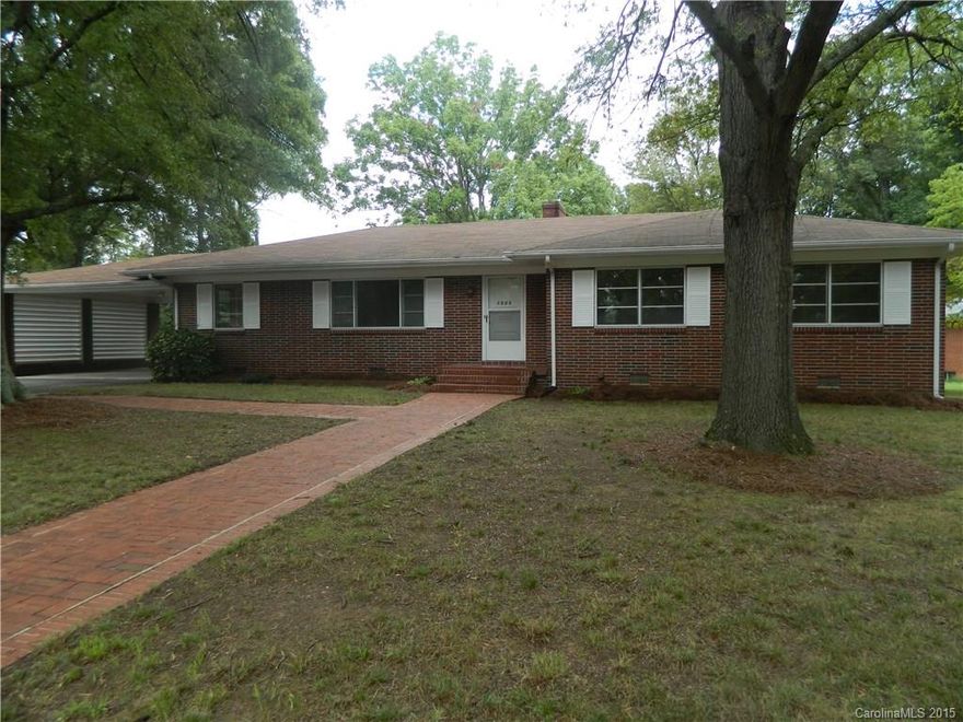 Beautiful brick home on quiet street with a large lot. This home features hardwood floors, newly remodeled kitchen with cedar cabinets, roof is approx. 4 years old