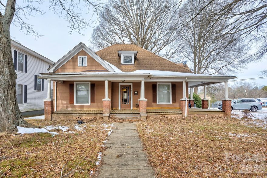 Discover the potential of this spacious 2 bedroom, 1 bathroom home, situated in Spencer with unmatched convenience. Located less than 2 miles from I-85, this property offers good proximity to new Rowan County industries, as well as a wealth of local shopping, restaurants, and entertainment options including the North Carolina Transportation Museum.
From the expansive wrap-around front porch, step inside and be captivated by the home's historic charm, featuring high ceilings and beautiful original wood floors that run throughout. French doors complete with glass knobs open into the center of the home. The generously sized rooms present a fantastic opportunity for the new owner to bring their vision and creativity to make this residence a stunning showcase.
The property sits on a level lot of nearly half an acre, providing ample outdoor space. Peace of mind comes with several recent updates, including a new gas furnace (2025), an electric hot water heater replaced in 2021, and a newer electric box installed in 2024.
This home is being sold strictly "as-is." Please note that all fireplaces are sealed and have never been operated by the seller. Don't miss your chance to own a piece of Spencer with great bones and an unbeatable location!