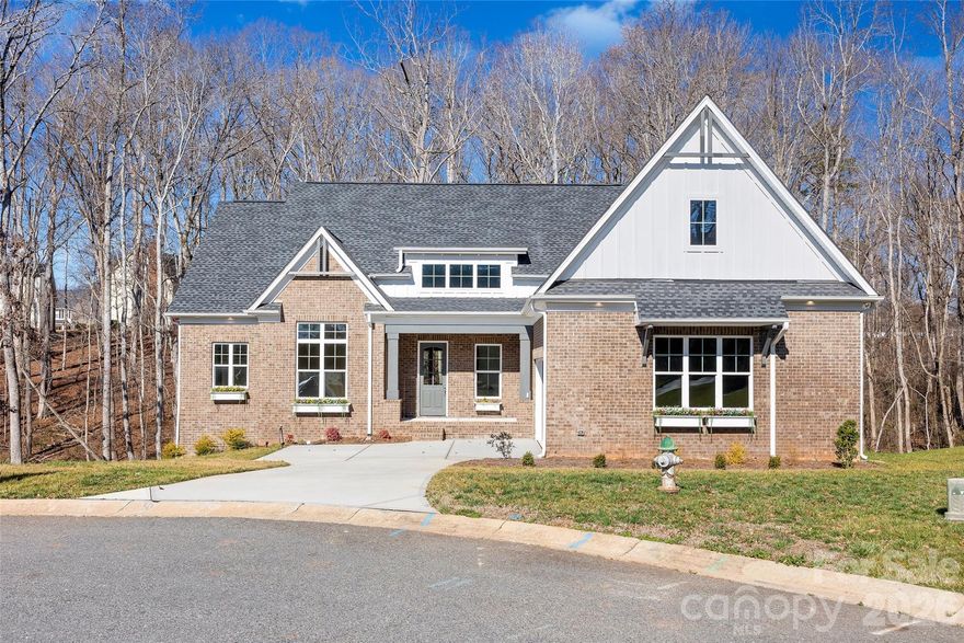 $40,000 BUYER INCENTIVE – Brand New & Move-In Ready in Meadow Lakes II! Recently completed and thoughtfully designed for multi-generational living, this stunning residence offers the quality of custom construction without the wait. The main level features an open-concept layout ideal for both everyday living and entertaining. A gourmet kitchen anchors the space, seamlessly connecting to the dining and living areas and extending to an outdoor living room and grilling deck for effortless indoor-outdoor flow. The spacious main-level owner’s suite serves as a private retreat, complete with a spa-inspired bath highlighted by a large curbless walk-in shower, dual vanities, and generous closet space. A separate wing on the main floor provides exceptional flexibility—perfect for guests or a private home office. The expansive daylight lower level offers impressive additional living space, including a dedicated theater room, recreation room, and two private guest suites with full baths. With abundant natural light and thoughtful design, this level is ideal for entertaining or accommodating guests. For a limited time, buyers may take advantage of up to $40,000 in concessions — applicable toward closing costs, interest rate buy-down, or other allowable expenses. Days on market reflect construction period.