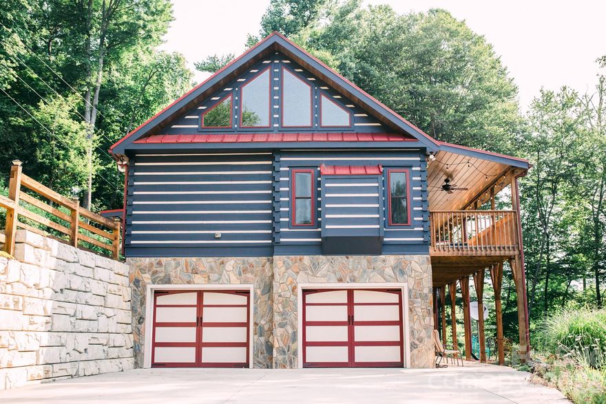 Tucked away in the cozy town of Black Mountain. This gorgeous cabin offers the perfect blend of comfort. space, and elevated mountain living. This private cabin backs up acres of unoccupied mountain land. Inside, the home greets you with impressive cathedral ceilings, an open floor plan, and master on the main. The thoughtful layout offers 3 bedrooms and 3.5 bathrooms and an office int he basement. The home is designed for both relaxation and functionality. Step outside to enjoy the pockets of mountain views, private hot tub, wraparound porch. Every detail of this cabin has been carefully cared for offering generous space throughout. A true mountain gem you have to come see to fully appreciate.