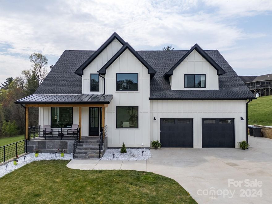 Welcome home! This magnificent home is nestled in Ridgeview Meadows community, on a spacious 1.05 acre lot. This 5,668 sq ft home is a builder's personal residence and was thoughtfully built. 4 Bedrooms are paired with WIC, and 4.5 Baths. Kitchen on main and a kitchenette in the basement. Two laundry locations. Main level also includes generously sized primary with an en suite and private porch. Spacious living and dinning area, breakfast nook, office, attached 2 car garage, and a covered porch. Several bonus/rec rooms awaiting your creativity. Recently finished basement could be used as a separate living quarters or STR. Smooth flowing layout and neutral colors will make furnishing a breeze. Must see to appreciate design and quality!