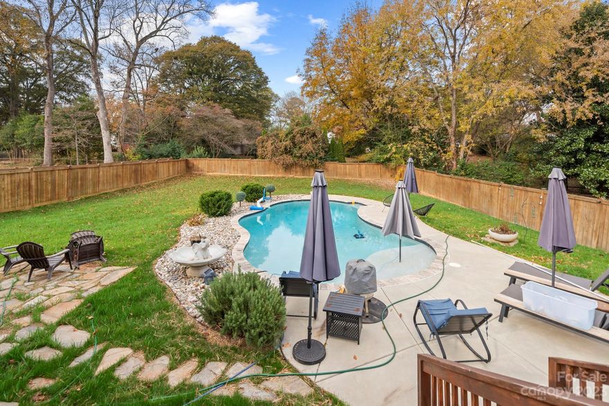 Home apprised for $560,000 - INSTANT EQUITY in this one!  Heated pool and large deck add to the beauty of this home that was remodeled in 2019 with a new HVAC, new roof, new siding, refinished original hardwood floors and updated appliances.  There is a 26,000 gallon heated salt water swimming pool in the fenced back yard.  Home is located within walking distance to Davis Park, Tennis Courts and Belmont Central.  Furniture, TV's and all appliances are negotiable in the sale.  New grass planted this fall.