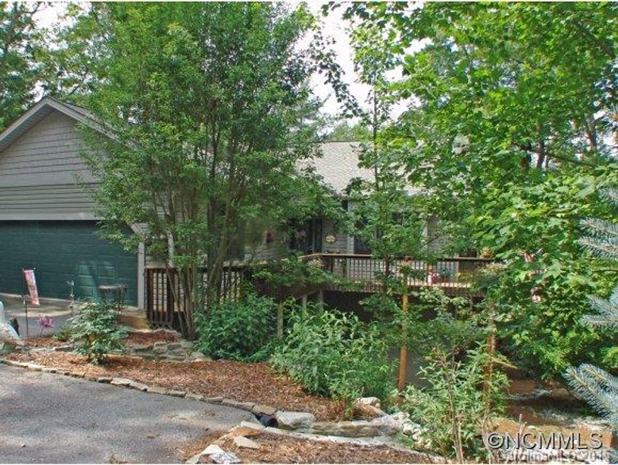 Newer home with room for family and friends! Huge upscale kitchen with an Island, Stainless Appliances and a walk in Pantry. Hardwood floors in the Great Room and a beautiful stone fireplace. There is an enclosed sun porch for relaxing and wrap around decks too. Downstairs are 3 more bedrooms and 2 more baths with plenty of storage. There is also a new heat pump. Come look! $8000 Amenity Fee to be paid by Buyer.