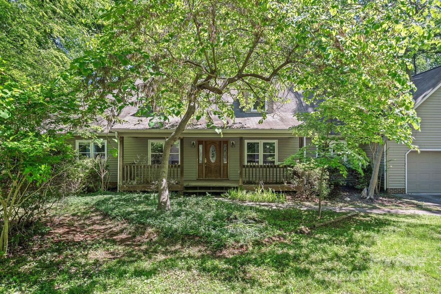 Waterfront on Lake Norman! Live the lake life on over 1.3 acres just outside The Point within a short distance to club amenities at Trump National Golf Club Charlotte. This property offers 210 feet of shoreline, a floating dock, rare boat ramp, private well and septic installed. This 3 Bedroom 2.5 bath home has plenty of potential to make a wonderful renovation project and increase the property value or build your dream lake house! The possibilities are endless in one of the most coveted neighborhoods on Lake Norman with no HOA. Property being sold AS IS.