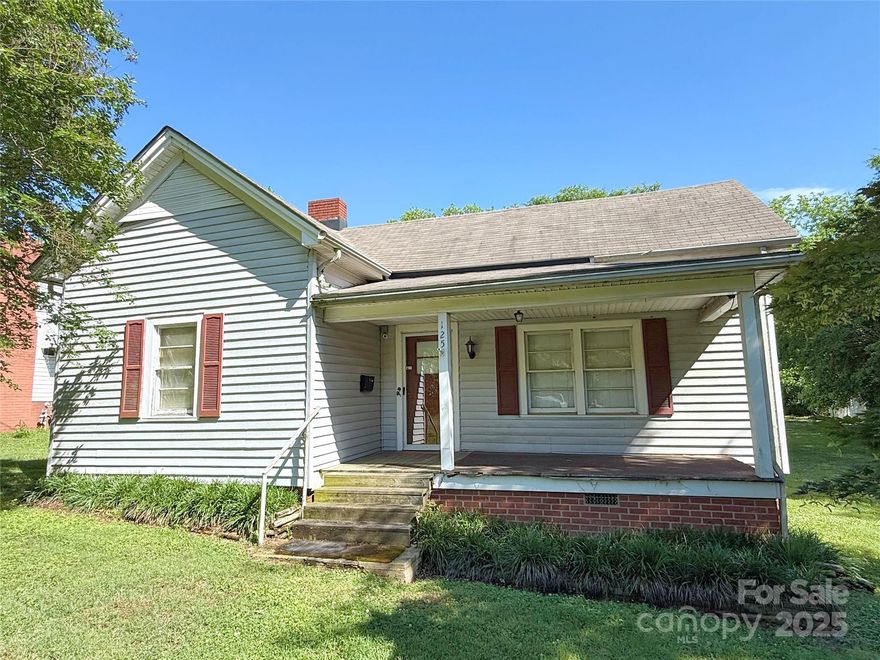 Do not miss your chance to make this 2 bed, 1 bath home yours. Loaded with potential and character. Super great lot, front porch, mature trees, strong deck, carport and outbuilding. Sold - AS-IS