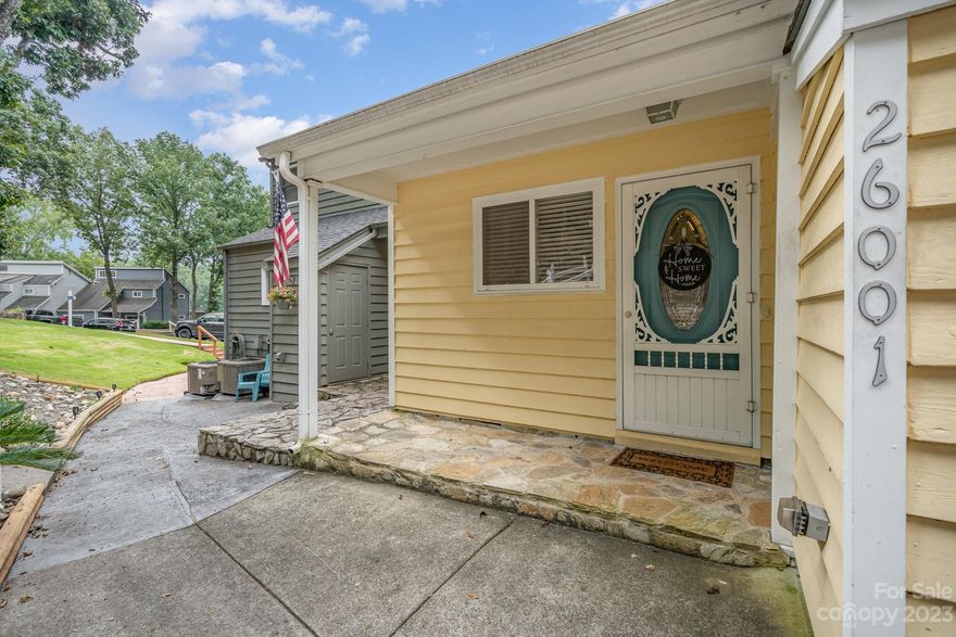 Welcome to Lake Life in Tega Cay on Lake Wylie! WATERFRONT End-Unit Townhouse comes with its own Deeded Boat Slip on a shared dock located in deep water across from Marina. The Community of Daybreak is a small townhouse community located on the shores of Tega Cay with all Deeded Boatslips. This unit boasts year round water views from the back patio.  This 2-Bed, 2.5-Bath, well kept townhouse has both bedrooms on the Upper Floor from where you walk in from your own private 2-car parking driveway. The Primary Bedroom Suite and Guest Bedroom and 2nd Full bath along with Laundry on the Upper Floor. The Lower Level opens up to both the kitchen and recessed living room and dining area. The Kitchen is highlighted by wall to wall cabinets and Quartz Counters. The living room is highlighted by a wood burning fireplace.  A short walk away you will find your private Boat Slip on a shared dock. The dock sits in deep water and has been updated with new boards and fresh paint this Summer.