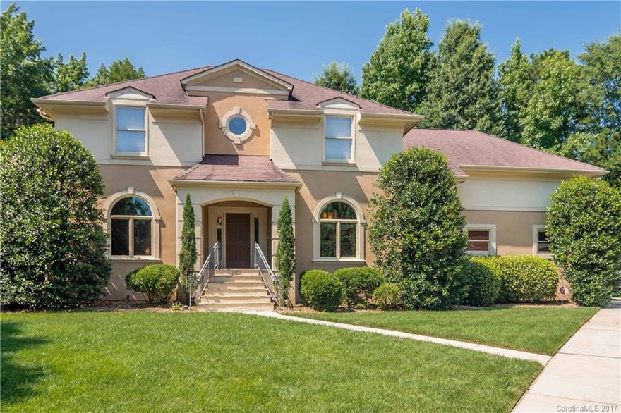 Fabulous Hard Stucco/Stone 2 Story with Master down!Master Bedroom & Dramatic 2 Story Great Room each have Fireplaces.Great Room opens to Kitchen with Tile bar w fresh paint! Kitchen has 2 pantries and 1 designed for entertainment accessories. Custom 42" cherry cabinets, flat top electric stove,Convection wall Oven & built in Microwave.Huge palladium windows opens to secluded deck with your very own Hot Tub which overlooks private backyard with mature trees, 2-10 HOME BUYERS WARRANTY