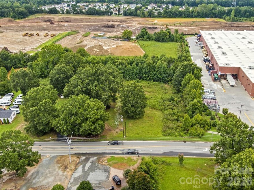 Prime Development Opportunity in Indian Trail, NC

Introducing a remarkable investment opportunity at 3619 Wesley Chapel Stouts Rd, situated adjacent to an exciting 62-acre development project that is set to redefine the local community landscape.

What’s Coming:
- A modern hotel catering to travelers and visitors
- A senior living facility providing quality care and community
- 94 upscale townhomes designed for families and professionals
- Apartment complexes offering comfortable living options
- Versatile office spaces for businesses
- Four retail outlets, bringing vibrant shopping and dining experiences to the area!

The planned infrastructure signal the area’s significant investment and potential for future growth. Permittable uses attached which include Pharmacy, Banks, medical offices, restaurant with drive thru, gas station, funeral home, car wash, post office, and many more options ! Call today and make an appointment. Home on property is of no value.
