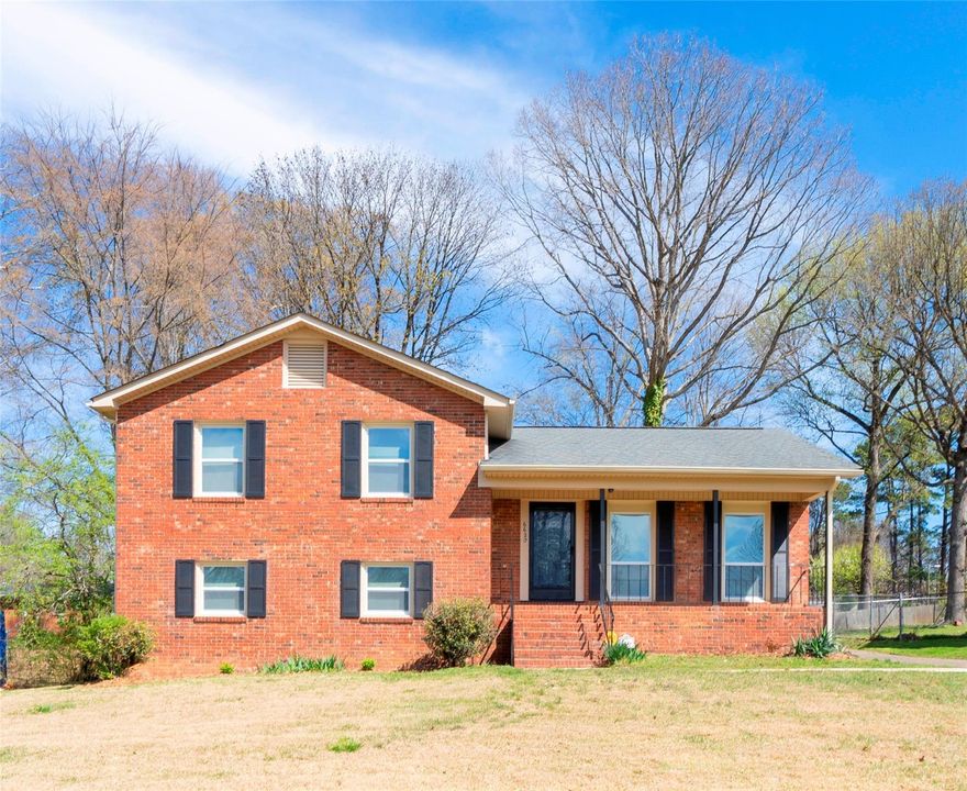 All Brick Split level home has 4 Bedrooms 2 full Bathrooms and the entire home inside and out has been meticulously renovated. Features all New Energy Efficient Windows, Gas HVAC, Electric Water Heater, Bathroom features Porcelain Tile Showers/Bathtub. Kitchen has New Cabinets, Granite Countertops, Stainless Steel Appliances. Fresh paint, LED Lighting and New Fixtures throughout. Flooring is Oak Hardwood. Basement features easy to clean Laminate Wood Floor. Home is great to entertain with in its 2 Living Rooms. Great front and Backyard also features a nice front porch to relax on.  Brand new shed for storage. Close to Interstates and Highways 85, 485, 77, and 277 and only few minutes to the Charlotte Douglas International Airport as well as Uptown Charlotte. All Shopping Grocery and Restaurants are close as well as so much to do in the area including Mt Island Lake and the White water Center.