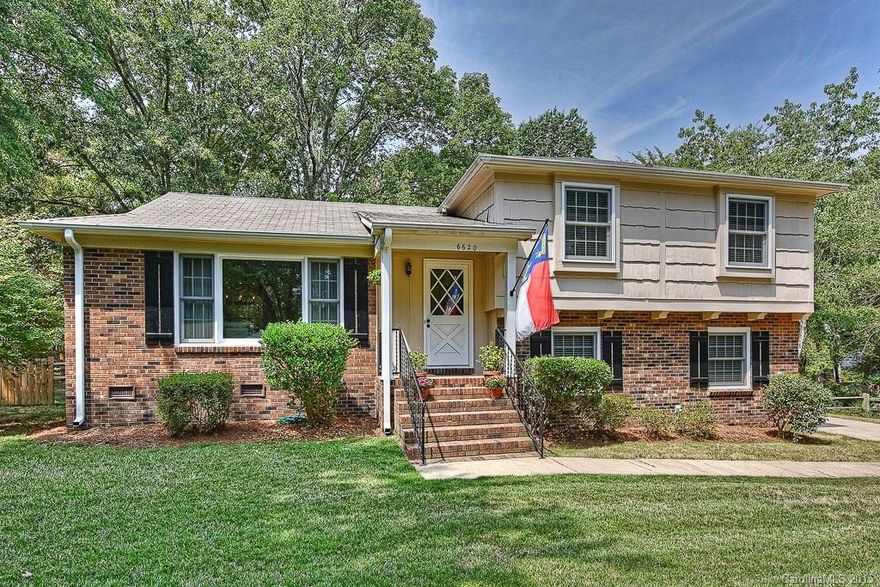 Absolutely stunning home in the desired community of Olde Providence. This home features hardwood floors throughout main & upstairs living areas. Main level w/ a large open family room, formal dining room, gorgeous crown molding throughout, Updated kitchen w/ tile backsplash & refinished cabinets, Master Suite Up w/ updated bath. Lower Level features great room w/ wood burning fireplace, guest bedroom, and laundry/mud room. Oversized Deck, fenced yard, & storage shed in back. Large .37 acre lot!