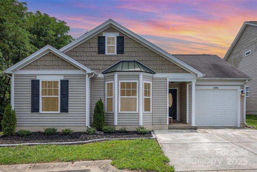 BACK ON MARKET due to no fault of the seller. Private fenced yard, open floor plan, new floors, top-rated schools, low SC taxes - all in the sought-after Arlington community. This immaculately maintained 3-bedroom, 2-bath home offers 1,194 square feet of light-filled living space with an attached 1-car garage. The open-concept layout is filled with natural light and features fresh flooring throughout. The spacious primary bedroom includes a full ensuite bathroom for added comfort. Enjoy the peace and privacy of being the last home on the street, with a fully fenced backyard ideal for relaxing or entertaining. Walk to the clubhouse, fitness center, pool, and sport courts just down the road. Zoned for top-rated Indian Land schools and just 10 minutes from the new Costco being built. A rare combination of location, value, and lifestyle. Come See!