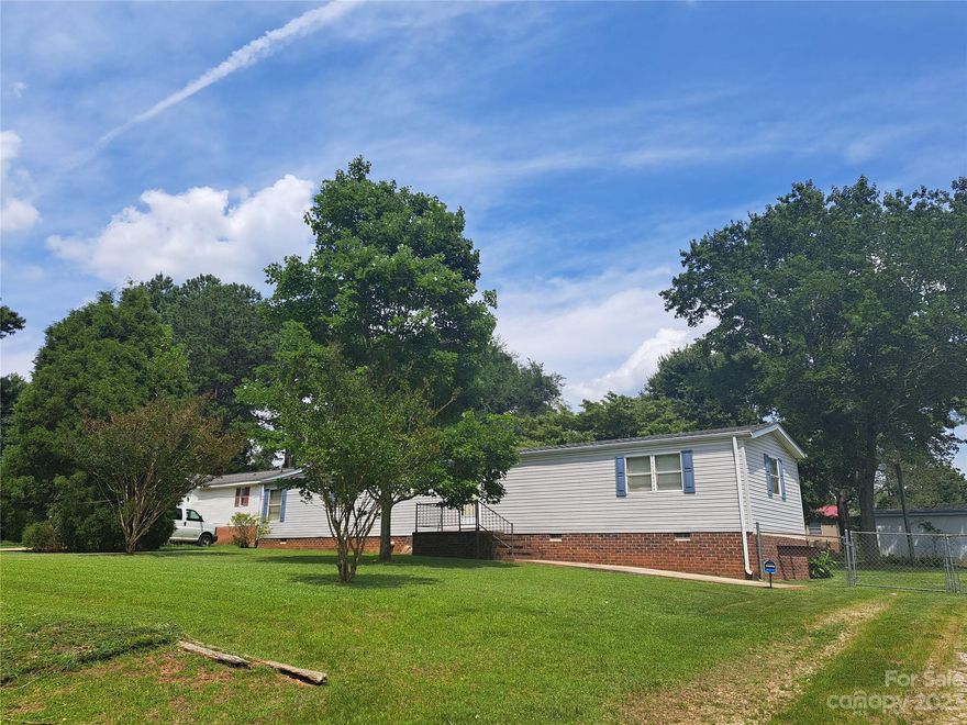 Welcome to this charming single-wide mobile home located in the heart of Salisbury, NC! Nestled within an established Westwood subdivision, this lovely residence offers comfortable living with two bedrooms, one bathroom, a fenced yard, and a convenient storage building. The open floor plan seamlessly connects the living room, dining area, and kitchen. The two bedrooms provide a peaceful retreat for rest and relaxation. 
One of the standout features of this property is the fully fenced yard, providing privacy for you, your family, and your pets. Imagine enjoying a morning coffee on the back porch or hosting outdoor gatherings in this delightful space. Situated in a prime location, this mobile home is just minutes away from I85, offering easy access to major highways and making commuting a breeze. You'll also appreciate the close proximity to a variety of shopping options, ensuring all your retail needs are met conveniently. The seller will not do any repairs! Sells as is.