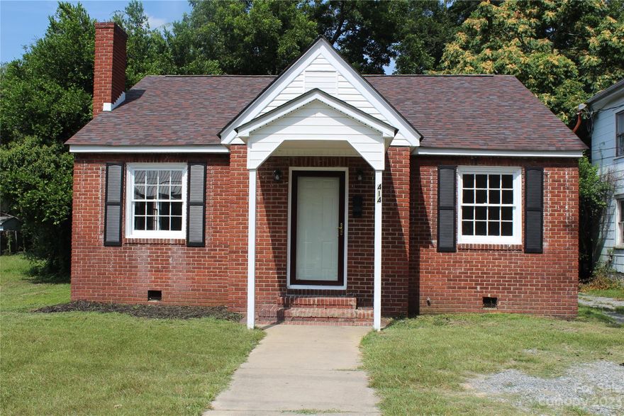 Come visit this NEWLY RENOVATED home in the heart of Hamlet! This home features hardwood floors, New LVP in Dinning room and Den.  New Cabinets and counter tops were installed in the kitchen. The main Level features 2 bedrooms and a fully renovated bathroom. A spacious upstairs to use as an office, reading room, or additional bedroom with a full Bathroom and Walk in closet. New Roof was put on April of 2023 and new Duct work with new Gas pack providing Heating and cooling on the 1st and 2nd floor. New water heater was placed in the basement. Basement can be used for a shop or extra storage space.  A classic home with good bones. Don't delay! Schedule your showing today!