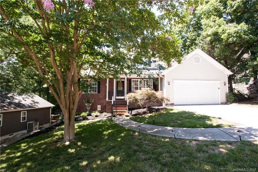 Nestled in the heart of Tega Cay, this much sought after community offers Golf, Tennis, Club House, Walking Paths, Playgrounds, Ball Fields and tons of community events.  This 3 bed 2.5 bath home has the master on the main, 2 bed and bath up.  Two large decks - One off the kitchen and an over-sized lower deck is perfect for entertaining.  Private fenced in back yard.  The unfinished basement offers 900 sqft of possibilities.  Crawl space with floored storage.  Over-sized 2 car garage.