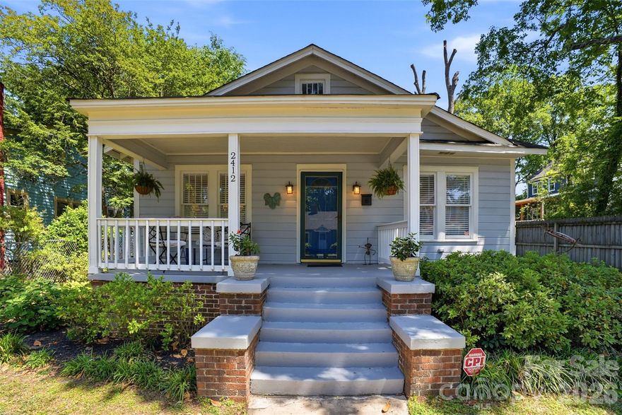 Welcome to this lovingly preserved, one-of-a-kind home in the heart of Villa Heights — one of Charlotte’s most sought-after historic neighborhoods offering character, walkability, and future potential. Ideally situated between the vibrant energy of NoDa and Plaza Midwood, this location places you minutes from some of the city’s best coffee shops, restaurants, parks, and everyday conveniences, all while tucked away on a charming residential street.
This 1939 two-bedroom, one-bath home is full of warmth, charm, and flexibility. 
Inside, you’ll find beautifully preserved original hardwood floors, vintage crystal door knobs, abundant natural light, and thoughtfully updated spaces including an updated kitchen and bathroom. Large windows throughout the home create a bright, inviting atmosphere while maintaining the character that makes homes from this era so special.
Step outside and enjoy the spacious backyard retreat complete with a storage shed, a garden, and plenty of room to relax or entertain. The welcoming front porch adds even more charm — the perfect place for morning coffee or unwinding in the evening.
This is not your typical cookie-cutter property. It’s a home with soul, history, and opportunity in one of Charlotte’s most exciting and connected neighborhoods — just minutes from Uptown while still offering the comfort and community feel that makes Villa Heights so beloved.
Whether you appreciate timeless craftsmanship or envision expanding the footprint into a three-bedroom, two-bath home, the possibilities here are endless. For buyers looking to build new, the flat lot provides an exceptional opportunity in a neighborhood where redevelopment and custom homes continue to thrive.
Don’t miss out!