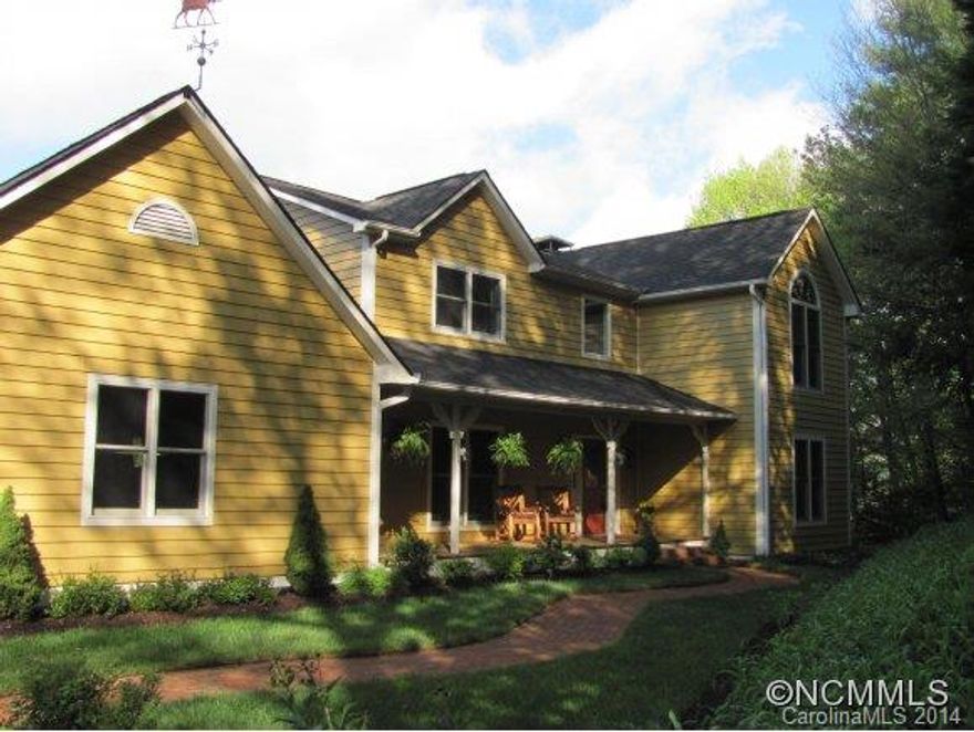 Well built home on 15+ acres in Windover Farms.  Open floor plan with Rock fireplaces & large  family rooms ready to entertain. Home has long range mtn views and over 1/3 mile of French Broad River frontage & approx 12-13 acres in pasture. Lower level offers rec room with pool table and exercise area. Large master suite has been completely upgraded with spa like bath. Home is full of tasteful upgrades and well taken care of! The land is beautiful