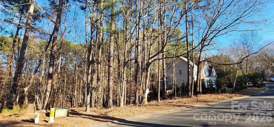 Excellent opportunity to build in the highly desirable Water Trace neighborhood of Tega Cay, SC. This ±0.39-acre residential lot offers a private, peaceful setting and is ready for construction with utilities available on site.

Enjoy a tranquil environment just minutes from shopping, dining, and use your golf cart to enjoy the premier local amenities including the 27-hole Tega Cay Golf Club, tennis and pickleball courts, and the marina with boat launch access to Lake Wylie. Tega Cay is also located within the award-winning Fort Mill School District.

Tega Cay is known for its strong sense of community, attractive South Carolina tax advantages, and convenient access to I-77 for an easy commute to Charlotte and surrounding employment centers.

Build-ready lots in Tega Cay are increasingly limited—don’t miss this opportunity to secure your place in one of the area’s most sought-after communities.