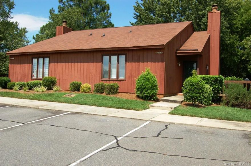 Location! Hidden gem near Carmel Commons (between Southpark & Ballantyne). Sell the lawn mower & live the life of ease! 2 bedroom condo overlooking the common area. Either bedroom could be the master. Open floor plan with vaulted ceiling & laminate flooring in GR, DR & Kit. New carpet in bedrooms.  Wood burning FP. Covered front entry. Large deck. Community pool, tennis & huge common areas!