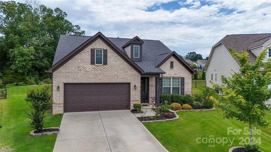 Welcome to this beautifully upgraded 2-bedroom, 2-bathroom ranch home, nestled in a peaceful cul-de-sac. The open floor plan seamlessly connects the spacious living areas, creating an inviting & airy atmosphere. The heart of the home features a modern kitchen w/ sleek countertops & top-of-the-line appliances, perfect for both everyday living & entertaining. The primary suite is a serene retreat, complete w/ a luxurious en-suite bathroom & ample closet space. The 2nd bedroom is equally comfortable & well-appointed, with easy access to the 2nd full bathroom. Each room has been thoughtfully upgraded to ensure both style & functionality.  Enjoy outdoor living w/ a large, covered porch, ideal for relaxing or dining al fresco, & an extended patio that provides plenty of space for gatherings & leisure activities. The 2-car garage offers convenience & additional storage.  This home combines modern amenities with classic charm. Don’t miss your chance to make this exceptional property your own!