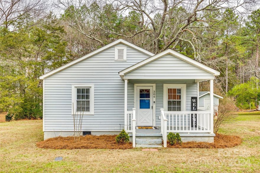 Adorable bungalow just minutes from downtown Stanley! Hardwood floors & molding keep the cozy charm, while the generously sized kitchen is full of updates - upgraded granite, soft close cabinets & drawers, dishwasher, sink, & microwave were all new in 2020 when Sellers purchased the home! The large peninsula offers plenty of room for seating and a perfect flow between spaces for entertaining! HVAC was replaced in 2016, and the Refrigerator, Washer, & Dryer will all convey for easy move-in! Enjoy relaxing on the covered front porch, or head to the back deck (with a sail for added shade!) that overlooks your spacious, peaceful, tree-lined back yard. Storage shed w/ power has built-in shelving, & the yard space in front offers plenty of room to add a driveway. First-time buyer? Investor? Downsizing? This is the one! Conveniently located to Lake Norman, Mount Holly, Belmont, & Gastonia, & just 30 minutes to Charlotte Douglas International Airport, this gem is a MUST-SEE!