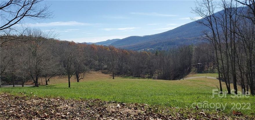 Ashe County Acreage - priced BELOW tax value - 16.278 GIS acres in Jefferson NC - Ready to use right away.  Build you dream home with incredible mountain views.  Elevations over 3200 ft.  Gravel road in excellent condition already installed.  Property is made of 12 individual lots being sold all together under tax value.  No Subdivision Covenants and Restrictions.  Perfect for outdoor recreation - hunting, hiking, camping, etc.  Mature timber. Contact listing agent for additional information.  Easy to find, great access to paved Wade Bare Rd.  Minutes from Jefferson and West Jefferson.  Seller to retain water rights from well to residences off property via easement.