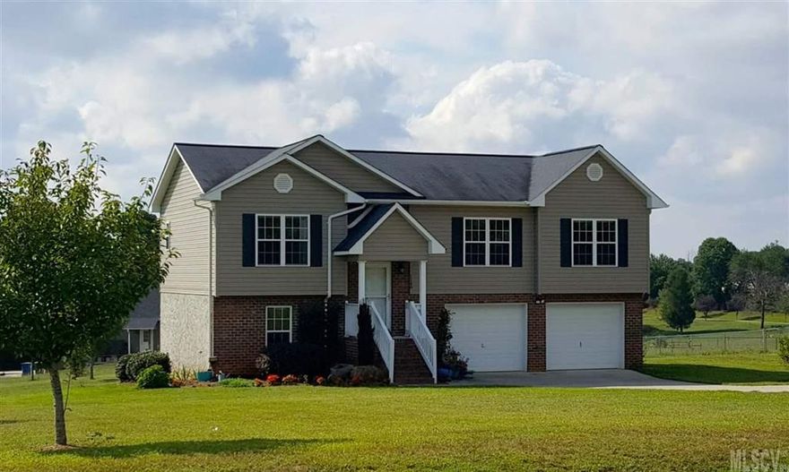 Nothing to Do But……move right into this well kept, spacious, 3 bedroom, 2 bathroom home with easy maintenance-free brick and vinyl exterior.  Cathedral ceilings  in great room. Kitchen with custom cabinetry, dining area & laundry on main level. Perfect for a young family or retirees! Master bedroom w/private bath & walk in closet on one side of the home and 2 additional bedrooms & bath on the other side offering  privacy for all.  Lots of windows and natural sunlight coming through this home. Downstairs host a double garage and unfinished  area that would be great storage or finished for more living space! Convenient to grocery stores, restaurants, shopping and only minutes from Lake Hickory!! LOTS of square footage for the money!!