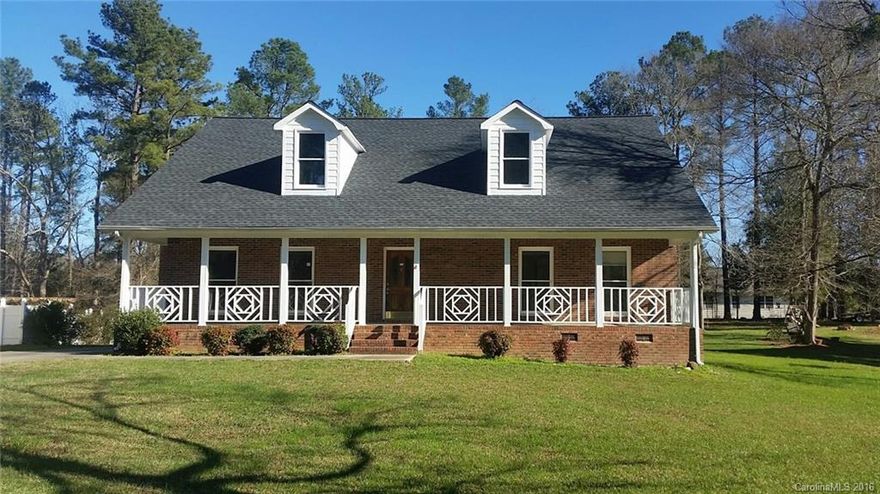 Make this spacious brick house your home by finishing some updates and renovations.  It features three bedrooms and three full bathrooms in addition to the half bath!  The first floor master bedroom features two walk in closets and has a private entrance from the carport , which is adjacent to the mudroom. The needed renovations were started with some new carpet, some fresh paint and some new flooring.  There is easy access to a public driving range.