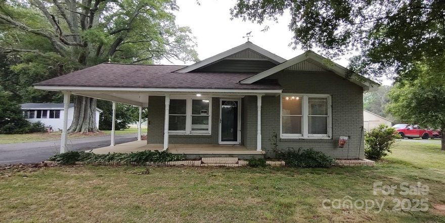 Investment Opportunity! This 2-bedroom, 2-bath home on .88 acres across two parcels in Kings Mountain presents a fantastic opportunity for renovation. Built in 1920, this 1764 sqft property offers a fireplace in the living room and a spacious lot with horse amenities, including a barn, stable, and tack room. The property is centrally located just off Hwy 74, between Gastonia and Shelby, and only 9 minutes from the Two Kings Casino.

Please note, this property requires significant updates, including HVAC, electrical, kitchen, flooring, and foundation work. The septic permit is for 2 bedrooms. Utilities include septic, cable, electricity, and city water. The exterior features fenced pastures, storage, and various outbuildings like a feed barn, shed, tractor shed, and workshop. A circular asphalt driveway and a 2-car carport are also present. This property is ideal for cash or hard money buyers looking for a rewarding project.