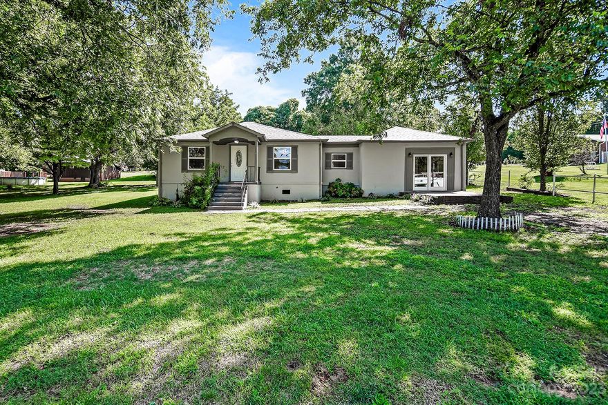 This charming ranch home offers 3 bedrooms and 2 bathrooms, making it an ideal choice for both first-time homebuyers and savvy investors. Situated within walking distance of downtown Conover, residents can easily access shopping, restaurants and the vibrant farmers market. The interior boasts fresh paint and recent updates, creating a welcoming ambiance w/an abundance of natural light. The kitchen features an attractive tile backsplash & modern stainless steel appliances, with the added bonus of included appliances like the refrigerator, washer, and dryer. Outside, the property boasts mature landscaping on a level lot, offering a peaceful outdoor retreat. With its convenient location & move-in-ready condition, this home represents a fantastic opportunity for those seeking a comfortable residence or a smart investment property. Don't miss the opportunity to make this delightful Conover ranch your own.