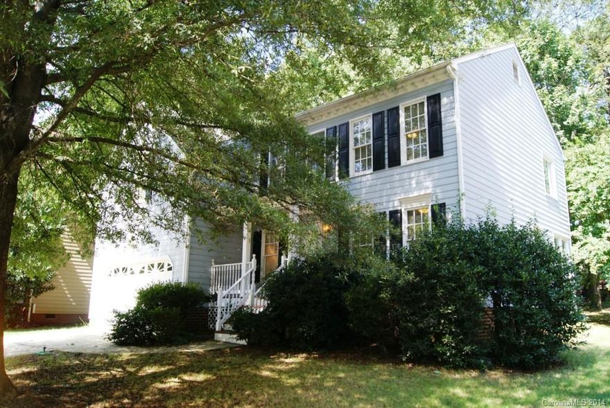 Sitting Front Porch - 4 Bedroom/Bonus Room - Wood Flooring - Kitchen Tile Flooring - Tons of Windows & Natural Light - Great Floor Plan w/Three Levels - Mature Lot - Rear Deck w/privacy - Level Lot - Two Story Great Room - Large Breakfast Area w/Bay Window - Kitchen Island - Vaulted Master Bath - Master Bath Dual Vanities - Master Bath Garden Tub/Separate Shower - Neutral Paint - Master Bath Tile Tub Surround - New Lighting - Updated Ceiling Fans - Close to Three Major Highways/Two Large Malls