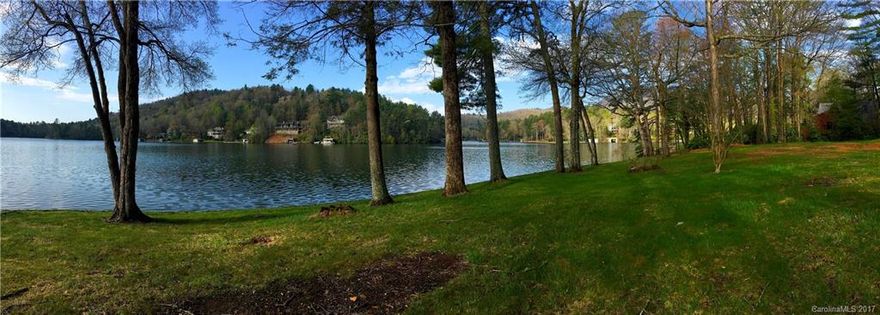 Once in a blue moon a very special property becomes available.  This 1.25-acre south facing lot offers panoramic views of Lake Toxaway, over 255 ft of protected shoreline, and mature hardwoods.  Already in place: a driveway, boathouse site, sea wall, and a new 4-bed septic and well permit. C 81 and C 82 are separate lots, which offers a desirable opportunity to build a house and a guest house.