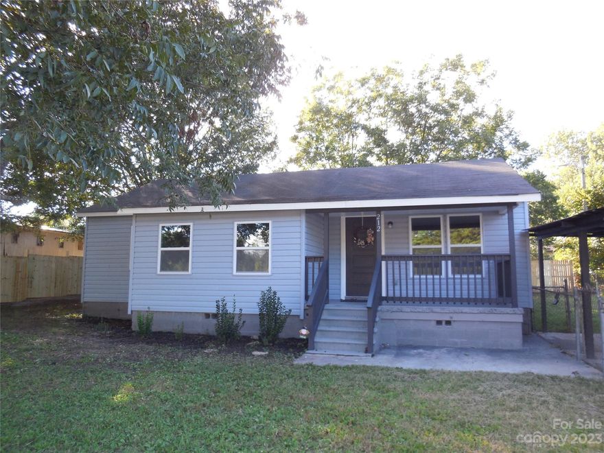 NO HOA!!! Adorable ranch bungalow.  3 bedrooms and 2 FULL baths.  Great location.  Totally updated.  Deck off back door at kitchen.  New roof/vinyl exterior/stainless steel kitchen appliances/electrical/vinyl plank flooring throughout/interior walls and ceilings. Laundry closet located in kitchen area. Mature pecan trees enhance the lot.  Concrete driveway with covered carport. Partial privacy fence to be installed by Seller.