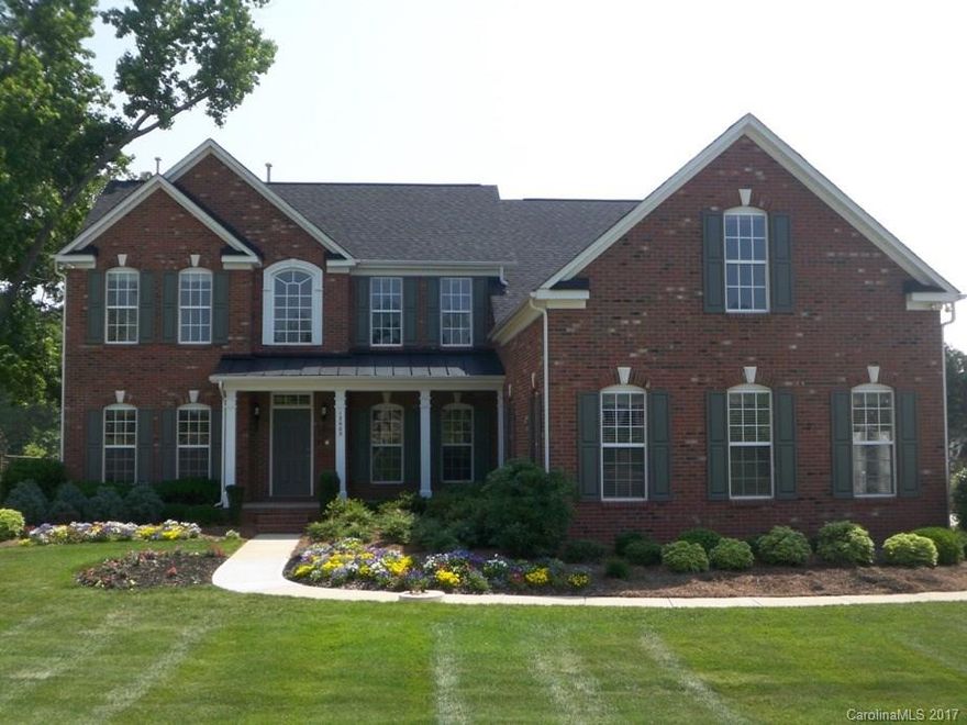 Gorgeous Mint Hill Home On Almost 3/4 Acre Lot! Former Model Home featuring 2-story foyer, LARGE MB DWNSTRS W/Tray Ceil, His/Her Walk-In Closets, Sitting Rm w/french doors leading to deck, Mstr Bath W/His/Her Vanities & Garden Tub. Huge Gourmet Kit W/Dbl Ovens (1 Convect) & 2 Pantries. Bright Brkfst & Grt Rm W/Vaulted Ceil. Form DR W/Tray Ceil & Study W/Built-In Cabs. Sound Sys,Intercom, Sec Sys. Lg Bonus. Office & Rec Rms Could Convert To 3-Car Garage. Built-in Irrigation system.