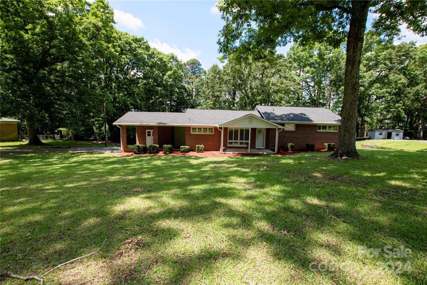 Welcome to your new home sweet home! This charming 3 bedroom, 1.5 bath brick ranch is the epitome of comfort.  As you step inside, you're greeted by the timeless elegance of plantation shutters adorning the windows. Say goodbye to worries about maintenance with recent updates including a newer HVAC system in 2022, PVC pipes installed in 2023 ensuring reliability, and a brand new water heater installed in 2024. The heart of the home, the kitchen, has been enhanced with a new dishwasher. Outside, you'll discover a freshly painted deck that overlooks the spacious backyard and a convenient attached carport with an entry door for easy access. Don't miss out on the opportunity to make this well cared-for residence your own. The washer/dryer and stainless steel refrigerator will convey with the home. The seller will pay up to $7,500 towards buyer closing costs.