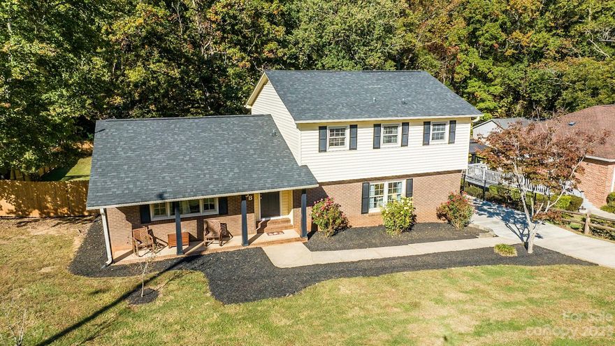 Do you like front porch sittin' in a quiet neighborhood!? This Charming home offers 2100+ sq/ft of completely usable space with a Mother-in-Law suite complimented by a permitted-additional Full Bath downstairs! Just a few steps up from the Den you can smell the home cooking in your updated granite counter top kitchen, soft close drawers included in pantry, laminate hardwoods will guide you everywhere in this house! Both spare bedrooms get to benefit from an updated full bath as well. 3 Full Baths all renovated! Outdoor features: Roof 5yrs New, full privacy fence(1yr Old), pressure washed siding, fresh curb appeal, cleaned out gutters, extra poured concrete, raised back deck, septic pumped 1yr ago w/added clean out system! Inside features: Newly Blown Insulation in Attics above standard levels, built-in shelving w/counter/drawers/storage/small desk area, Fresh paint throughout, new kitchen faucet, new remote ceiling fans & light fixtures! Semi-Walk-in Crawlspace w/Electric power!