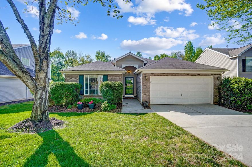 Welcome home to this wonderful ranch.  The open floorplan vaulted ceiling living room is full of natural light.  The primary suite has vaulted ceilings and an ensuite with a new walk-in shower and walk-in closet.  Enjoy the neutral color of the freshly painted home and new laminate flooring.  The kitchen has new quartz counters, a farmhouse sink, a new faucet, and a walk-in pantry. Sit outside on your patio that looks out over the fenced backyard.  The front of the home has 2 bedrooms with a full bathroom.   The community has sidewalks, an outdoor pool, a playground, and a basketball hoop. The washer dryer and refrigerator are included with the home.  Low SC taxes, but just minutes from the Ballantyne area of Charlotte and Redstone complex in  Indian Land to enjoy shopping, restaurants, & medical facilities. This home is very regularly maintained, pest control contract and HVAC bi-annually.