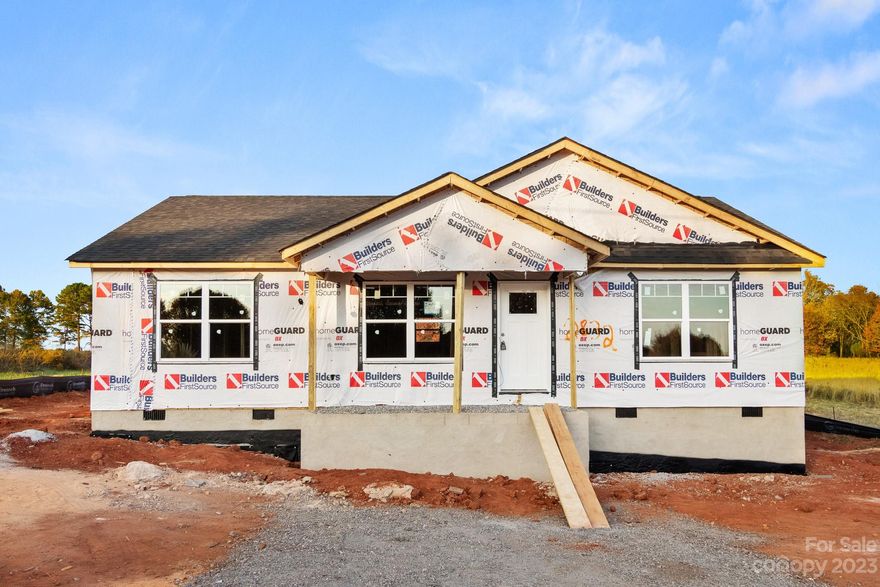 *HOME IS UNDER CONSTRUCTION* .  Estimated Completion Date of 02/25/2024. AWESOME 3 bed, 2 bath Ranch home features beautiful LVP in all main living spaces. Nice, OPEN Floorplan!  HUGE space between the Great room w/vaulted ceiling, Kitchen, and Dining area perfect for entertaining. Kitchen is STUNNING w/white shaker cabinets, granite countertops, Island, Pantry, and SS Appliances! Primary bedroom has Cathedral ceiling and HUGE walk-in closet! Primary bath has walk in shower and dual granite vanity! Both guest beds are great sizes and share the additional full bath w/single granite vanity and tub/shower combo. Almost 1 acre lot!  
Come see Quick!