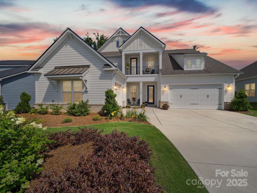 From the moment you enter, this luxury home impresses with thoughtful upgrades, and stunning finishes. Designed for everyday comfort and effortless entertaining, every detail has been curated for the discerning homeowner—from custom storage solutions to a chef’s kitchen that truly delivers. Only minutes to Waxhaw, Marvin, Indian Land, Harris Teeter, Costco, Target, & more.
Main-level primary suite: coffee bar, oversized shower, & large walk-in. In-law suite w/ wide doors, flexible home office, and open great room with gas fireplace, built-ins, and 3X sliders to screened patio. Kitchen boasts quartz island, KitchenAid appliances, bev center, prep kitchen, walk-in pantry, and custom cabinetry. Upstairs: Loft, 2nd suite with balcony, & 2 more beds, full bath. Outdoor oasis with paver patio, gas firepit, outdoor kitchen, pro landscaping, irrigation, & fenced yard. Smart Home: Wi-Fi thermostats, security, garage doors, lights. 3 car garage w/ OmniWall systems, shelves, & shop lighting.