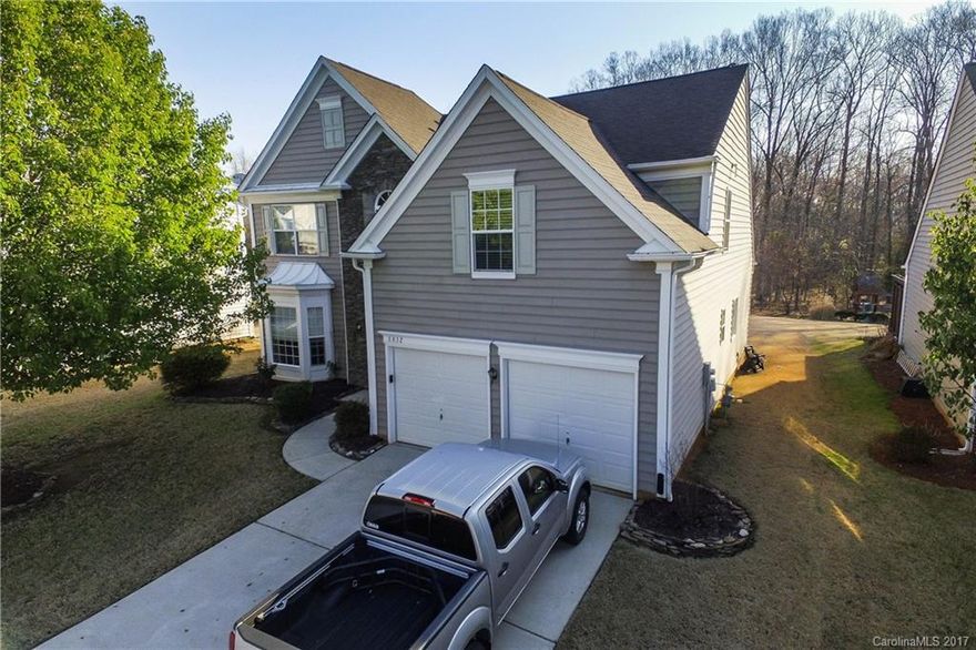 Updated home in Ballantyne. Best school district. Home has been completely updated with all new interior paint throughout, all new light fixtures, mirrors, hardware. Entire first floor has had new 5" pre-engineered hardwoods installed. Kitchen has been updated with granite countertops and gas range. Open floor plan with master bedroom on the main floor. New roof in 2011 & new HVAC in 2016. Backs to woods. Convenient to everything including 485 interstate. Offers being accepted through 3/26/2017.