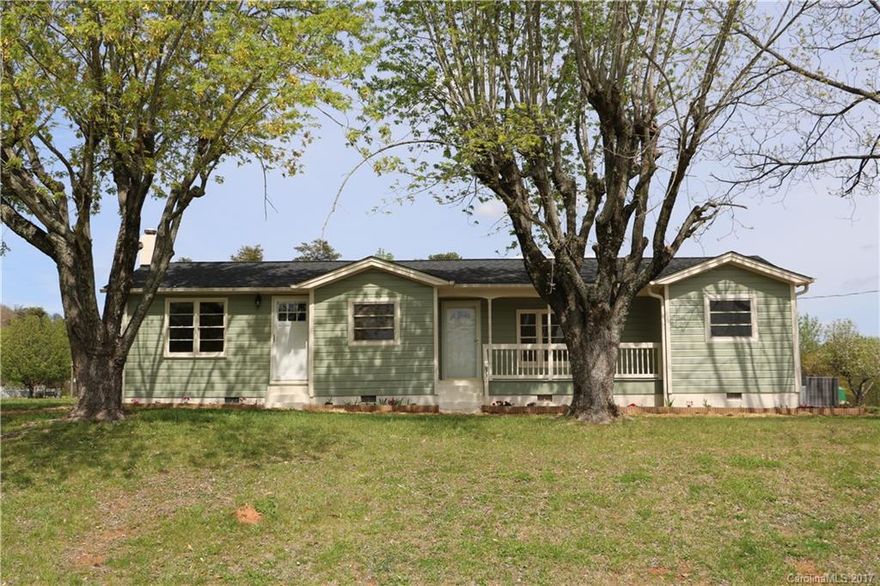 3 br 1 ba home on 10+ ac. LR, Kit/DR, laundry, dbl carport, hardwood/tile floors, barn, storage bldg., creek. open & wooded. New paint inside & out, new well, HVAC 2 yrs,arch.roof,2 yrs, water heater 1 yr, updated kit & bath. Rocking chair front porch.