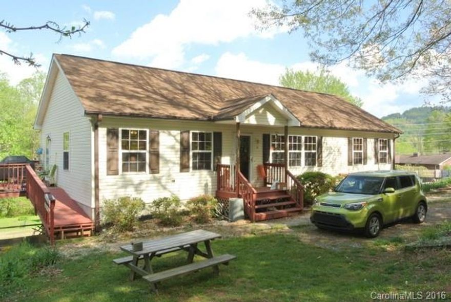 Sweet home just moments from Biltmore Park! This 2 bedroom, 2 bath property has a large master bedroom with an ensuite bath & huge walk-in closet. The kitchen has stainless appliances, loads of storage & counter space & also an island. The full basement offers additional storage or room to grow. Newer features include the hot water heater (2015) & heat pump (2014). The sunny, level yard has room for a garden & kids or pets. Entertain on your large deck! Need lots of parking? This home has it!