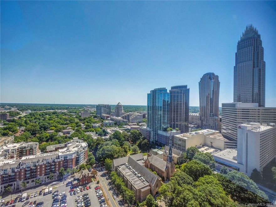 Terrific value in highly regarded Trademark building. First, height! Great city views from this 25th floor unit. Second, location! Quick walk to offices, dining, bars, culture. Third, building amenities! Upscale lobby, beautiful pool, exercise room, party kitchen, grill, secure parking. Fourth, terrific unit! Open & spacious w/neutral colors, hardwood & tile flooring. Kitchen w/island, stst, granite, trendy backsplash. Private MBR w/clever privacy panels. Tiled master bath. Fifth, ready now!