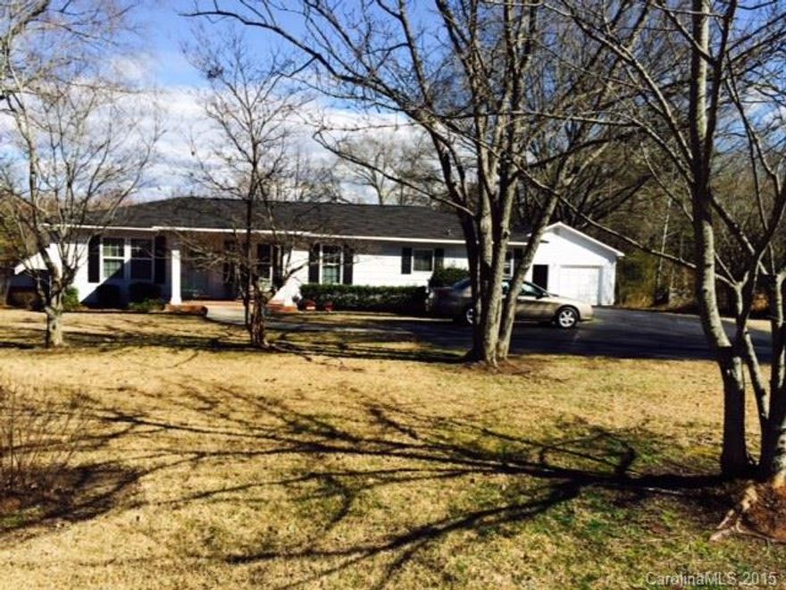 Cute Bungalow in the County.  Sold "As Is", but lovingly maintained.  Warm and Inviting Home.  Nice Large Den/Great Room with Fireplace in back of house. View of pond in back of house.