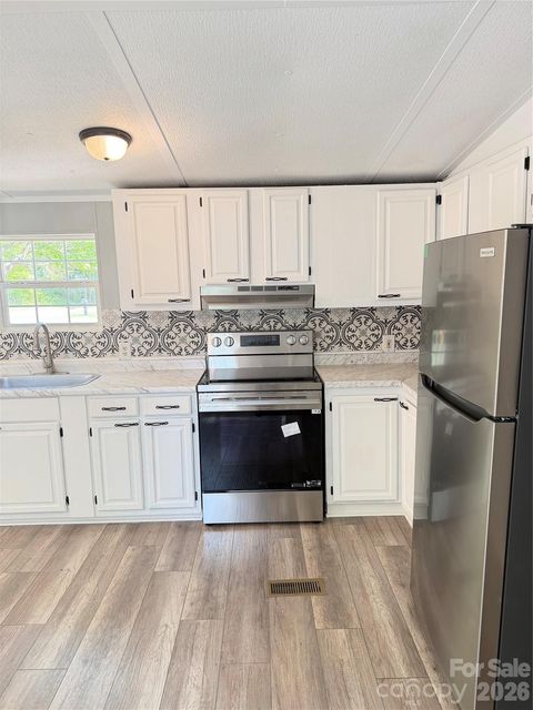 Photo of 110 Tulip Tree Court, Statesville, NC 28677 (MLS # 4373274)