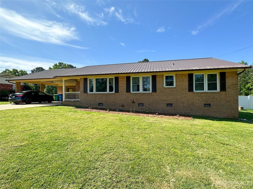 Don’t miss this 3 bed/2 bath ranch style home in the established Anderson Heights neighborhood. Originally built in 1974, this traditional ranch lives large with a formal and informal living space. The floor plan also features a unique Jack-n-Jill bathroom between the secondary bedrooms. The primary bedroom has access to a large main bath. Meticulously maintained, the home has newer LVP flooring throughout, a metal roof, two car-carport, two car detached garage with new garage doors, and ample storage. The flat backyard is mostly enclosed by neighboring fencing, so it would be an easy project to enclose completely. A great property, this home can be easily updated to the taste of its buyer, but is move-in ready! Call today for a showing!