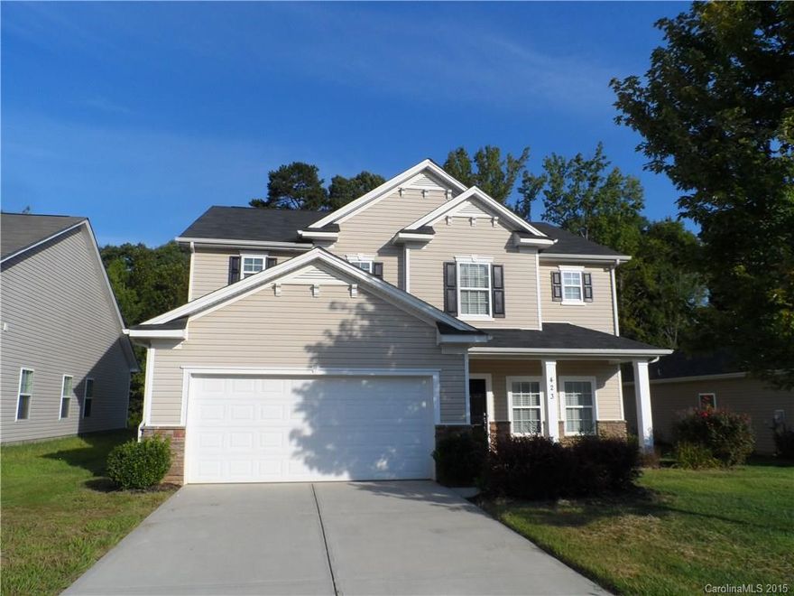 Spacious home with open floor plan!  Living room and family room located on main level with corner fireplace and open into kitchen.  Desired recessed lighting in kitchen and breakfast bar for ease of entertaining.  Enjoy the outdoors through the sliding glass doors.  All three bedrooms located upstairs with a large master suite including trey ceilings, huge closet and beautiful bath with garden tub and shower.  Loft area provides extra sitting area or office space.  Convenient to shopping!