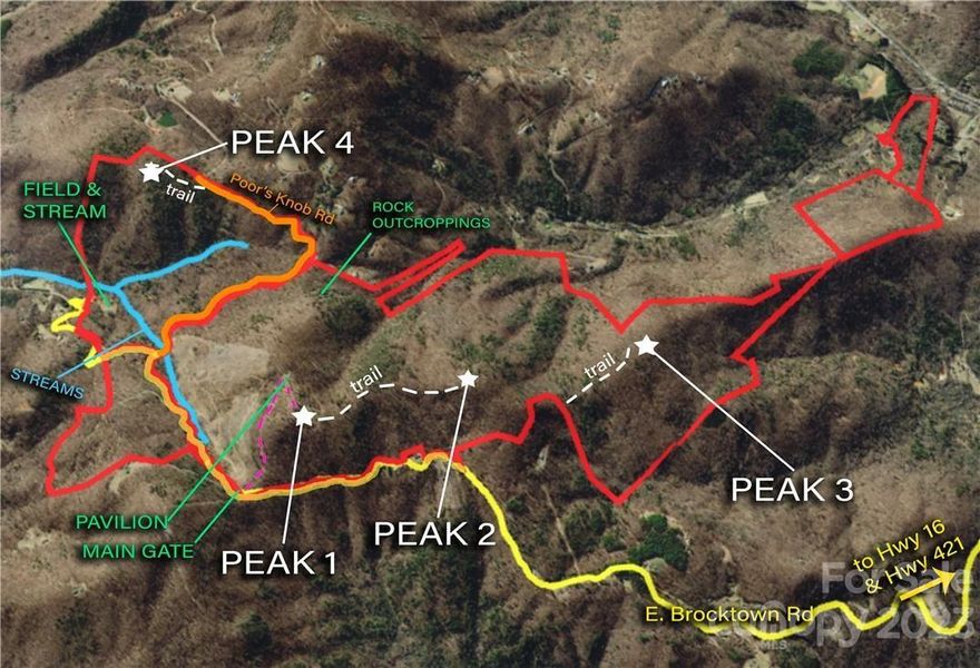 Four Peaks in the Brushy Mountains- a rare assemblage of a true, private sanctuary on 708+ acres encompassing 4 mountaintops & offering panoramic views, spectacular building sites, wooded privacy, water, boulders, trails, & more, just 14 mins off of Hwy 421 in Wilkesboro. Rising up to 2538 ft in elevation and w/ gentle ridge-lines connecting level home sites atop knolls & peaks of usable land, this tract offers potential for a family estate, hunting property, or development, among other uses (+ timber potential). With 2 view overlooks, the highest of the 4 peaks consists of a sprawling, grassy knoll w/ 360 degree views, w/ views of Grandfather Mtn, Mt Mitchell, Mt Jefferson, & Snake Mtn, stretching to the CLT skyline! Next to the highest knoll rests a rustic pavilion & large fire pit. At the base of 1 end of the property find a hidden meadow of wildflowers next to a stream- one of multiple waters cascading through the acreage! With exception of a 13ac piece, this tract is UNRESTRICTED.