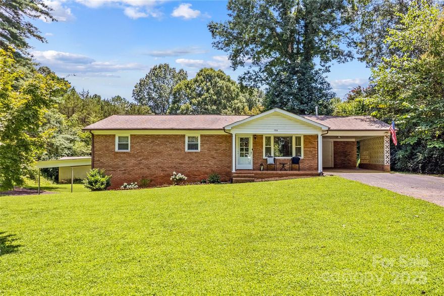 Tucked away at the end of a quiet dead-end street, this brick ranch sits on nearly half an acre, offering both privacy and space. Inside, you’ll find a freshly painted open living, dining, and kitchen area where updated flooring flows throughout, complemented by accent trim and updated lighting. The kitchen features ample cabinet storage, a built-in oven, and a window overlooking the backyard, while additional built-ins in the dining area enhances both style and functionality. Freshly painted bedrooms with original hardwood floors bring warmth and charm throughout the home. An attached carport with storage room enhances convenience, and the full unfinished basement—accessible from both inside and outside—offers endless potential for expansion or additional storage. The large backyard is ideal for outdoor living, gardening, or play—and includes a powered storage shed for tools, hobbies, or workshop needs. Major updates include a new roof (2020), HVAC (2022), and updated windows, giving you a solid foundation to make this home your own all conveniently located near schools, amenities, and highway access.