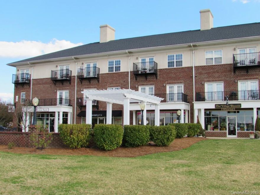 Move-in ready condo in desirable Afton Village is accessible by elevator or stairs. Great kitchen features solid surface counters, a new sink & faucet & attractive ceramic tile flooring.  Fresh paint, nice crown molding throughout.  New window treatments, refrigerator, and washer & dryer to remain. Live the good life and walk to your choice of several restaurants & bars, a bakery, boutique shops, a fitness facility & a 60-acre park w/running trail, disc golf & tennis courts. Convenient to I-85.