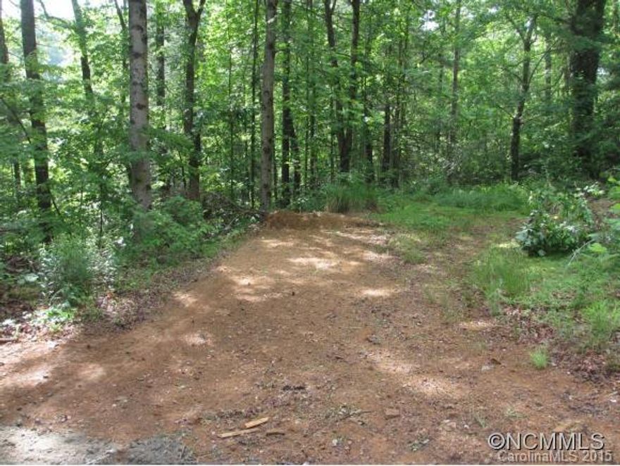 3 lots combined to form 4.5+ acre parcel with 2 existing building pads and easy access gravel drive. Build your home or add mobiles or modulars. Very private treed lots within 5 minutes of highway, but country feel. Sold "as is". Recorded shared well agreement at 1426/252, no septic records on file with County & no survey available. Great opportunity at low price!!  Lots 3,4,5 at slide 6508